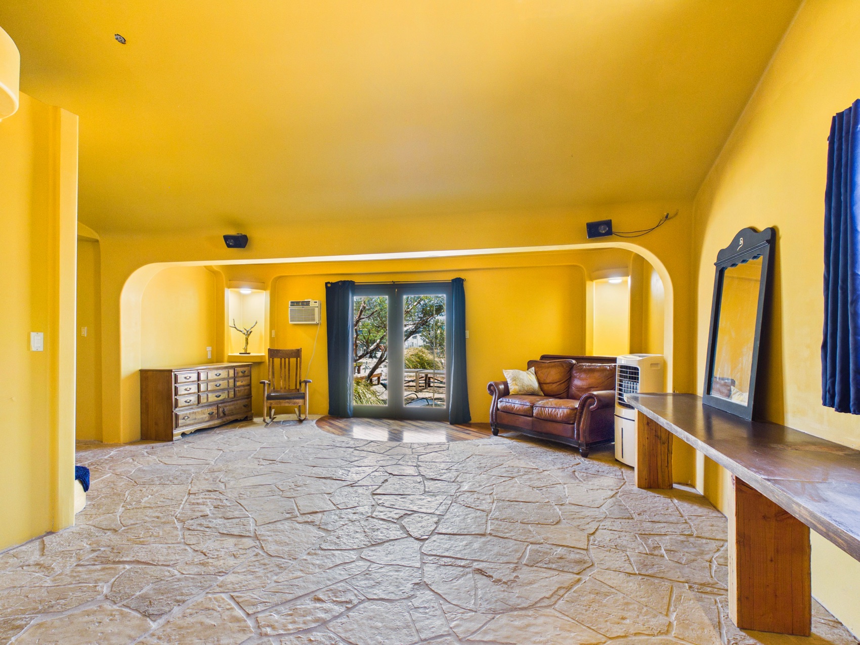 The great room, opening to the grounds