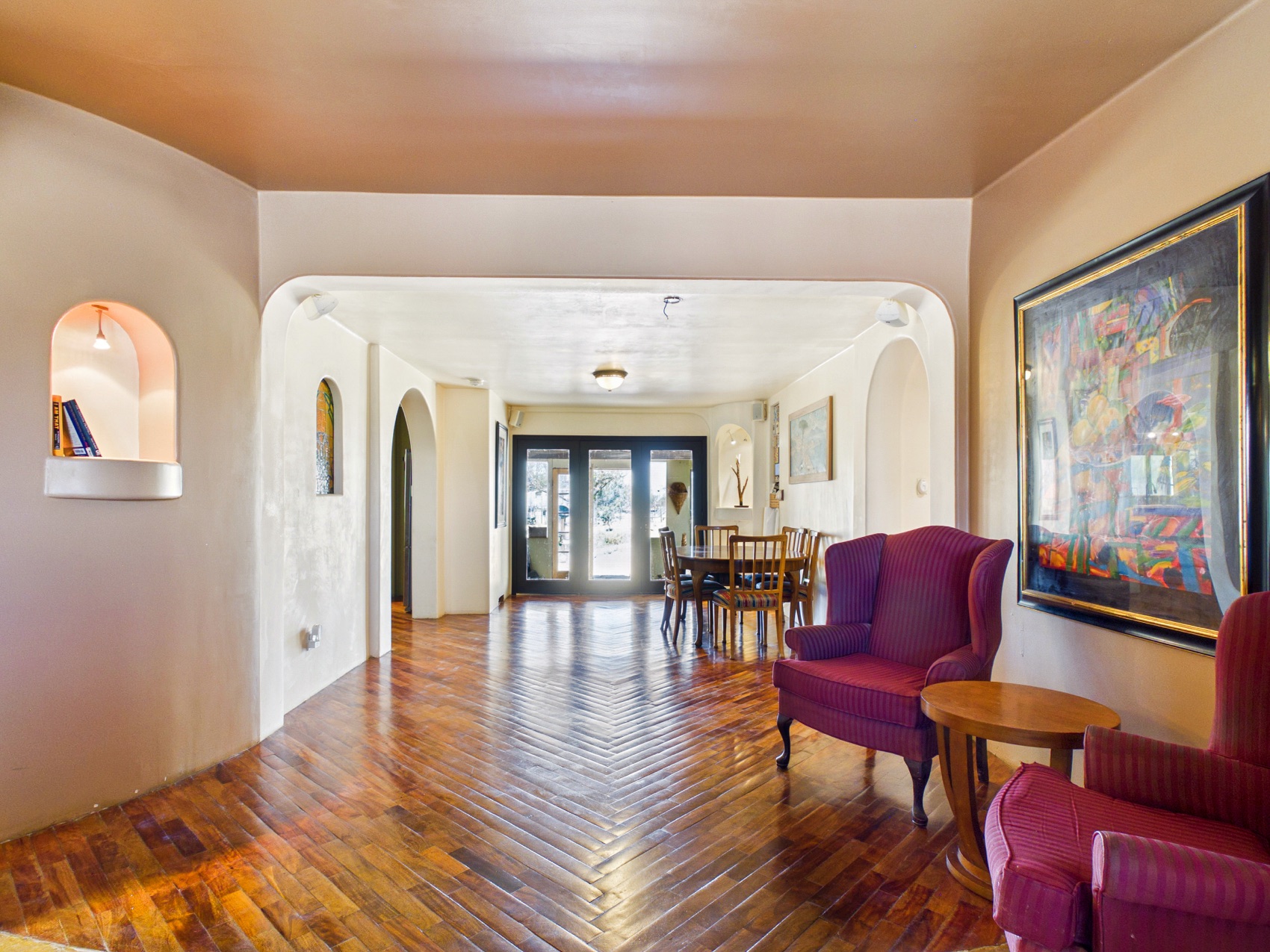 The vaulted arched central hallway