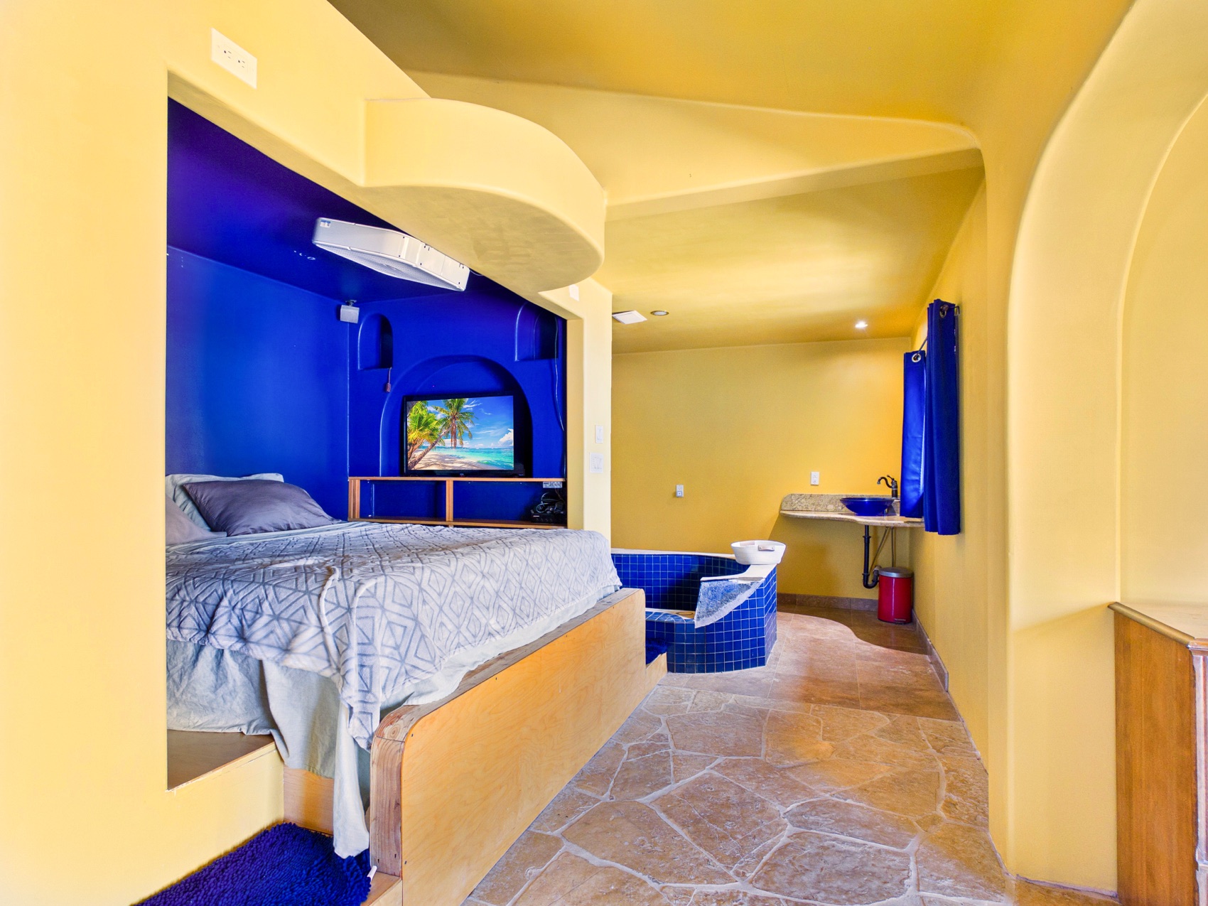 The soaking tub within its suite
