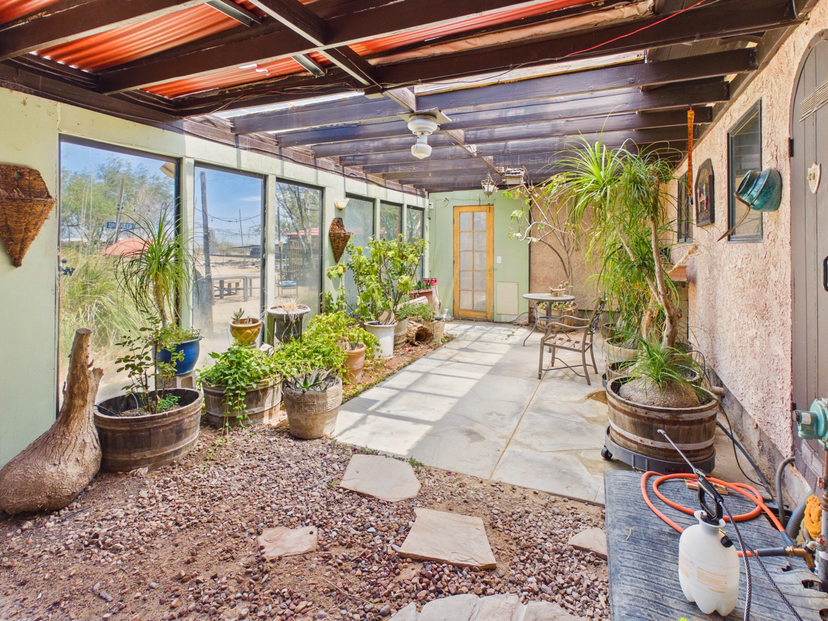 The plant-filled sunroom